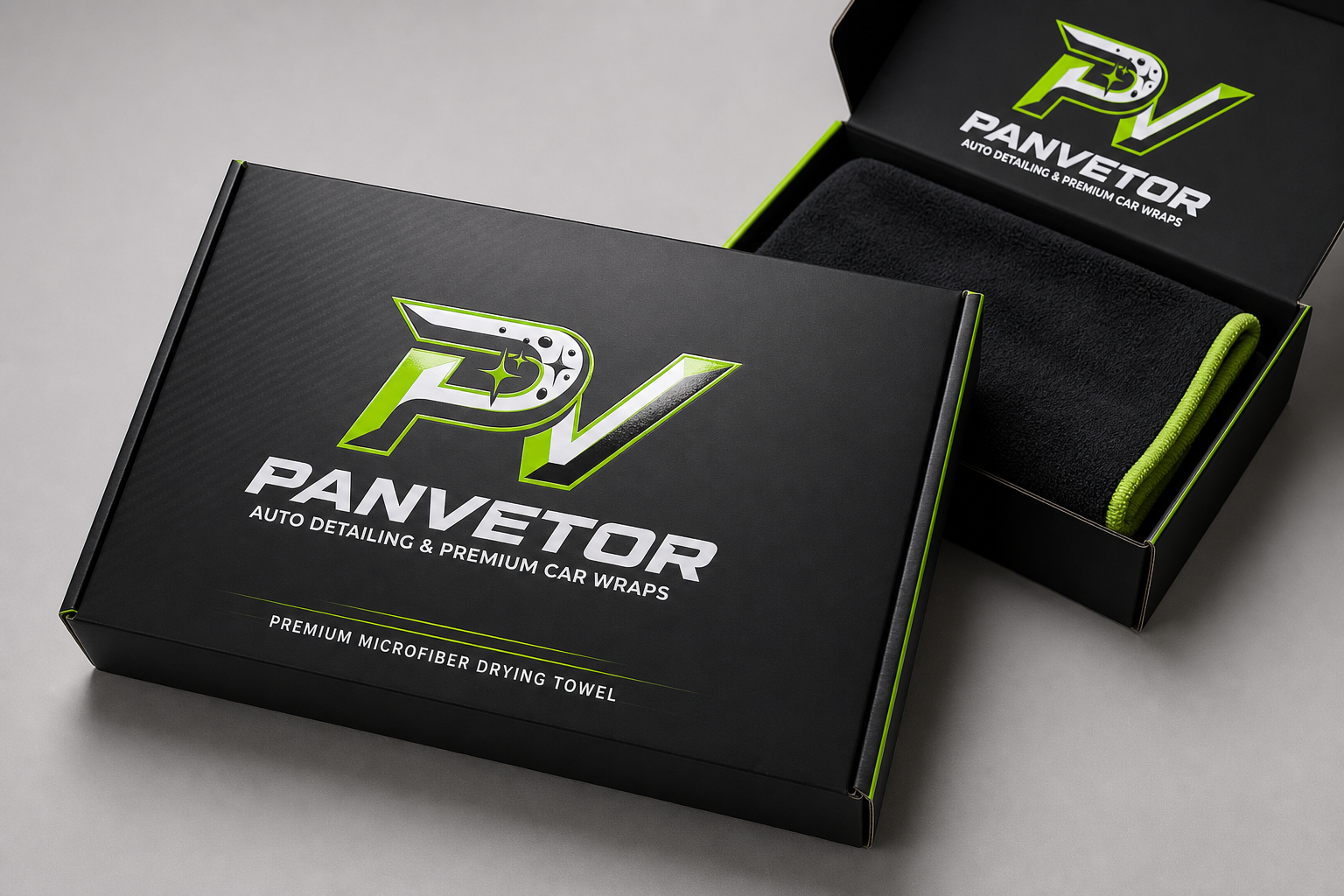 Black Panvetor microfiber towel gift boxes with green trim